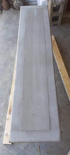 Long concrete piece after resurfacing and top-coating, Omaha