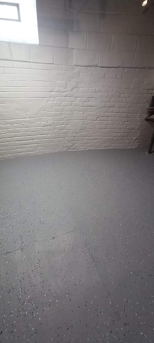 Finished bright dry basement with waterproofed walls in Omaha